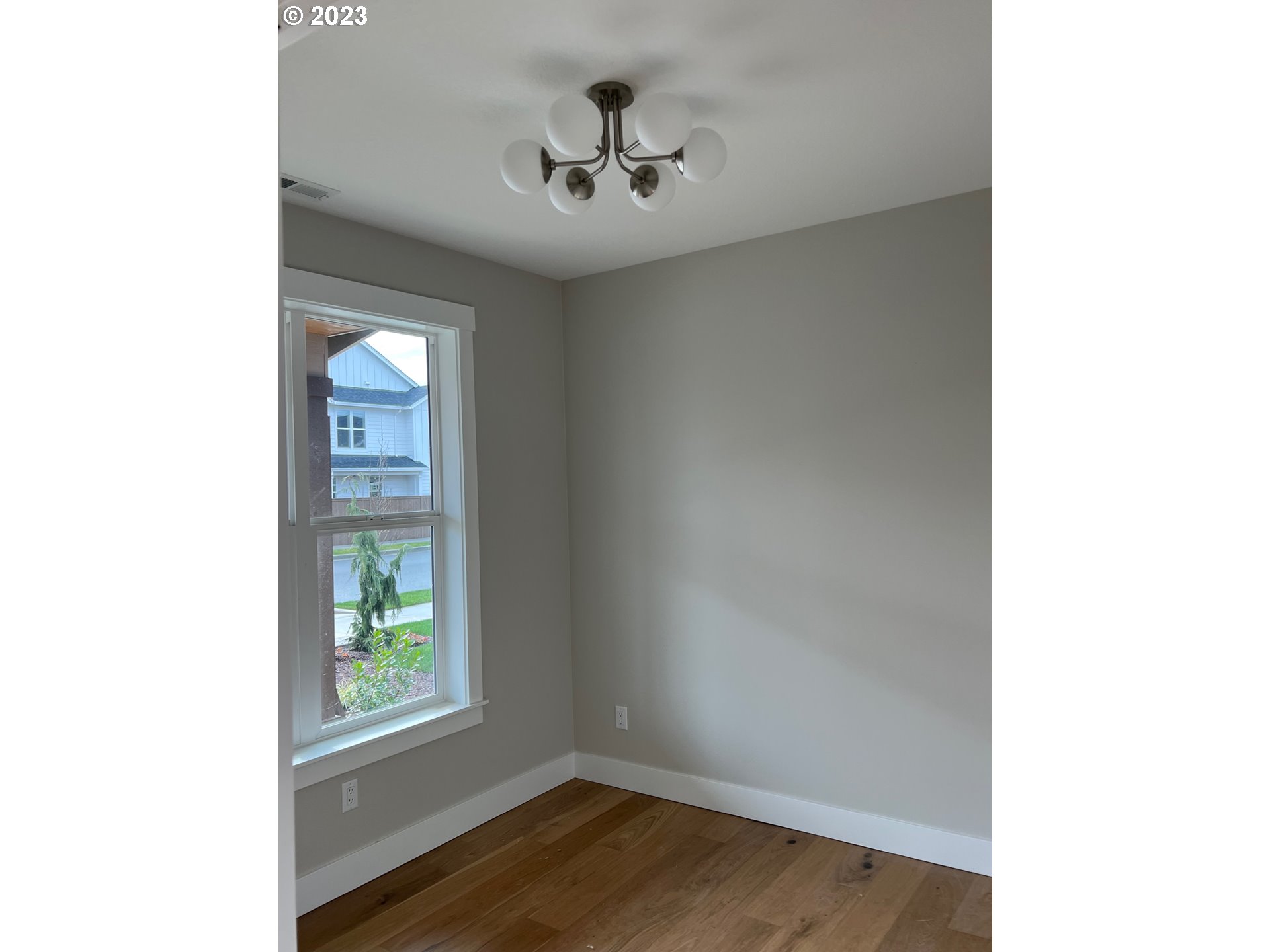 238 Southwest 18th Avenue Canby, OR 97013 - Photo 3 of 16 a view of a livingroom with a window