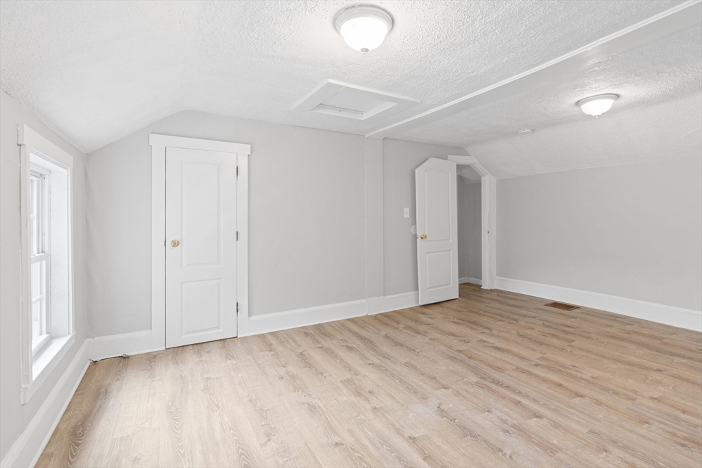 95 South Main Street, Unit B Andover, MA 01810 - Photo 20 of 34 wooden floor in an empty room with a window