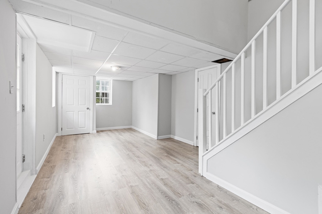 95 South Main Street, Unit B Andover, MA 01810 - Photo 2 of 34 a view of an empty room with wooden floor