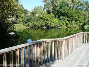 1385 Paddle Wheel Lane, Unit 50 Rochester, MI 48306 - Photo 17 of 21 Walk to pond and trails