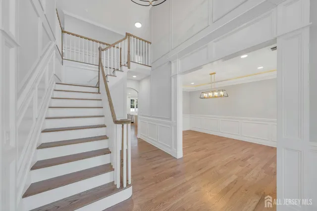 a view of entryway with wooden floor