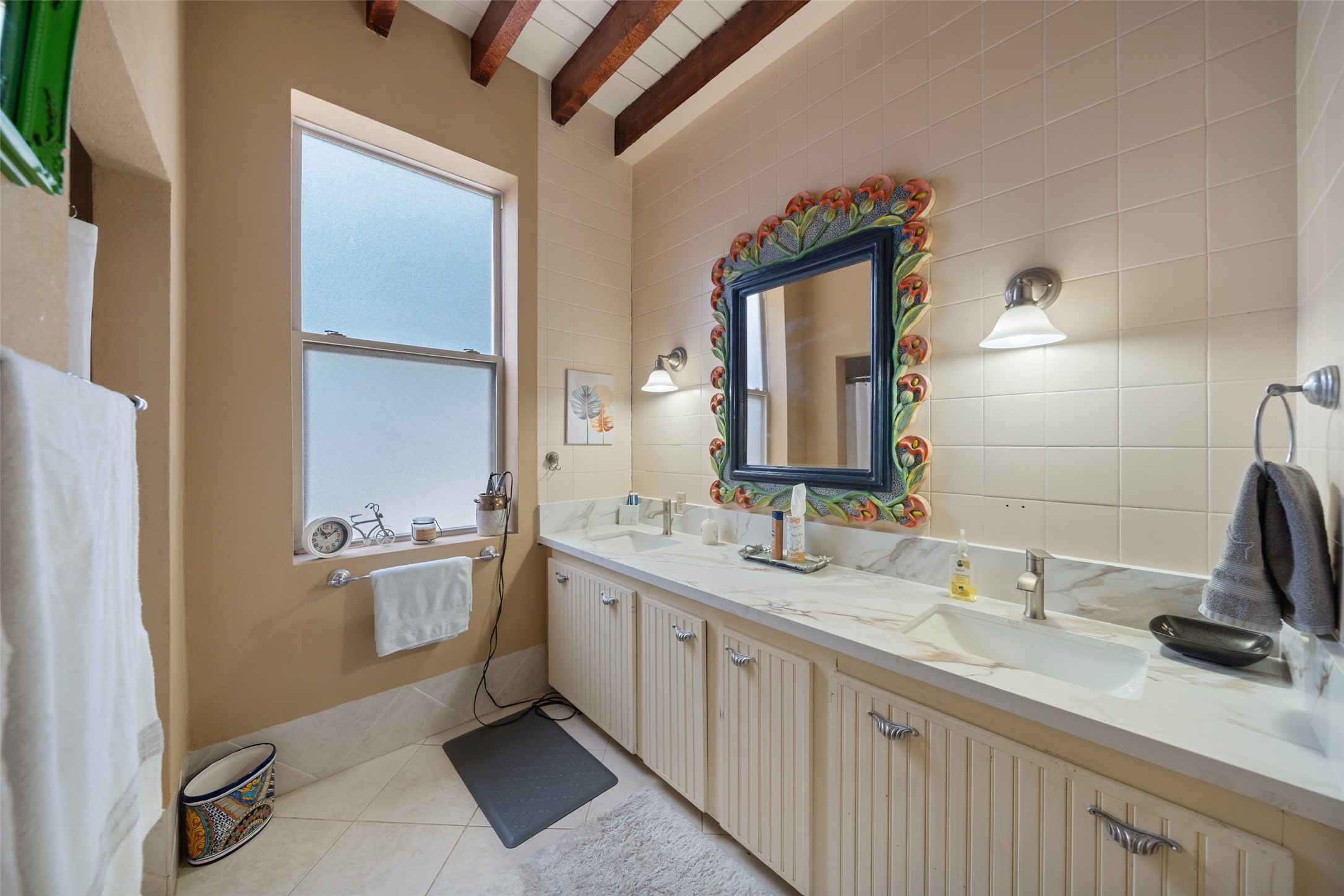 614 Pine Gully Road Seabrook, TX 77586 - Photo 34 of 49 a bathroom with a double vanity sink and mirror
