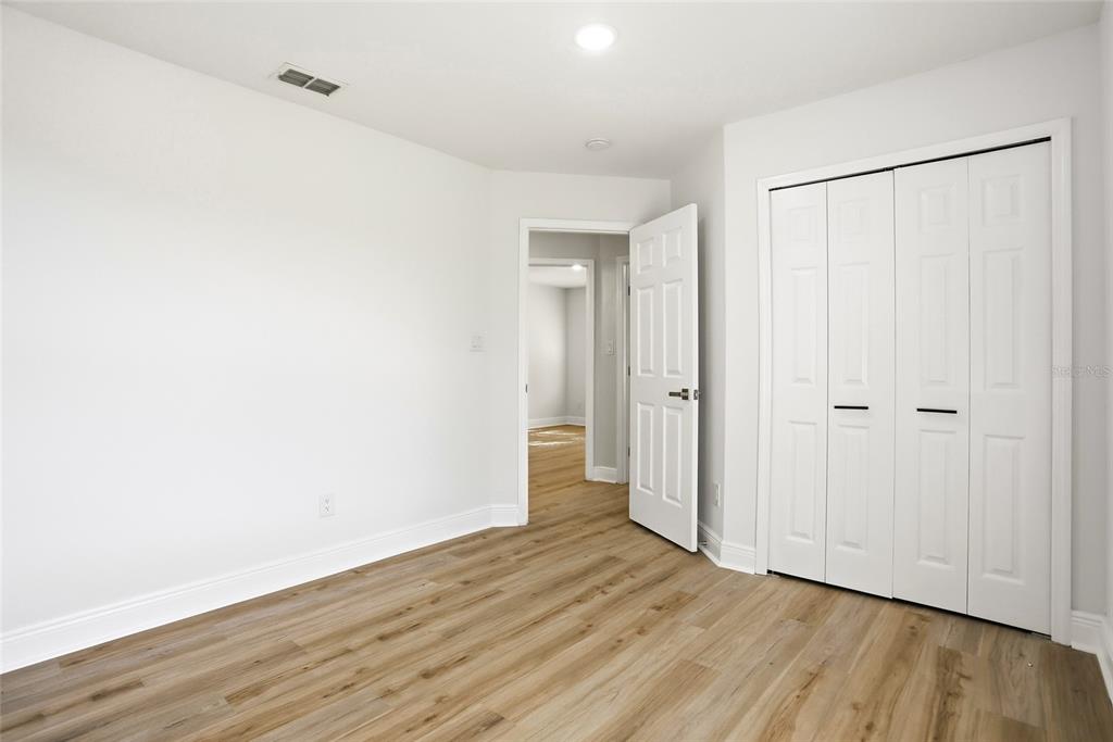 3345 Furlong Way Gotha, FL 34734 - Photo 25 of 34 a view of an empty room with wooden floor