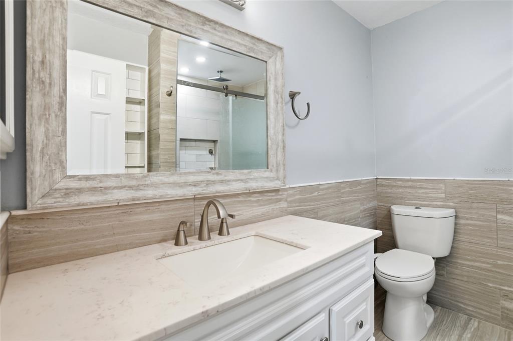 3345 Furlong Way Gotha, FL 34734 - Photo 28 of 34 a bathroom with a sink and a toilet