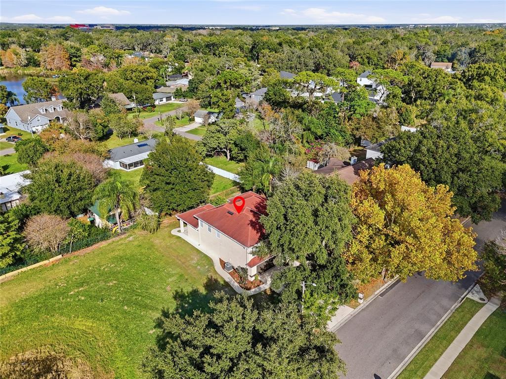 3345 Furlong Way Gotha, FL 34734 - Photo 32 of 34 an aerial view of residential houses with outdoor space and trees