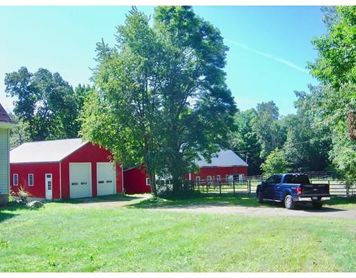 59 H Foote Road Charlton, MA 01507 - Photo 1 of 42 a view of a house with a yard