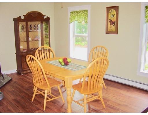 59 H Foote Road Charlton, MA 01507 - Photo 28 of 42 a view of a dining room with furniture and wooden floor