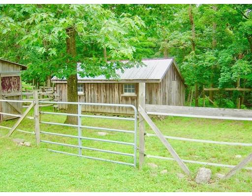 59 H Foote Road Charlton, MA 01507 - Photo 7 of 42 a view of a wooden deck and a big yard