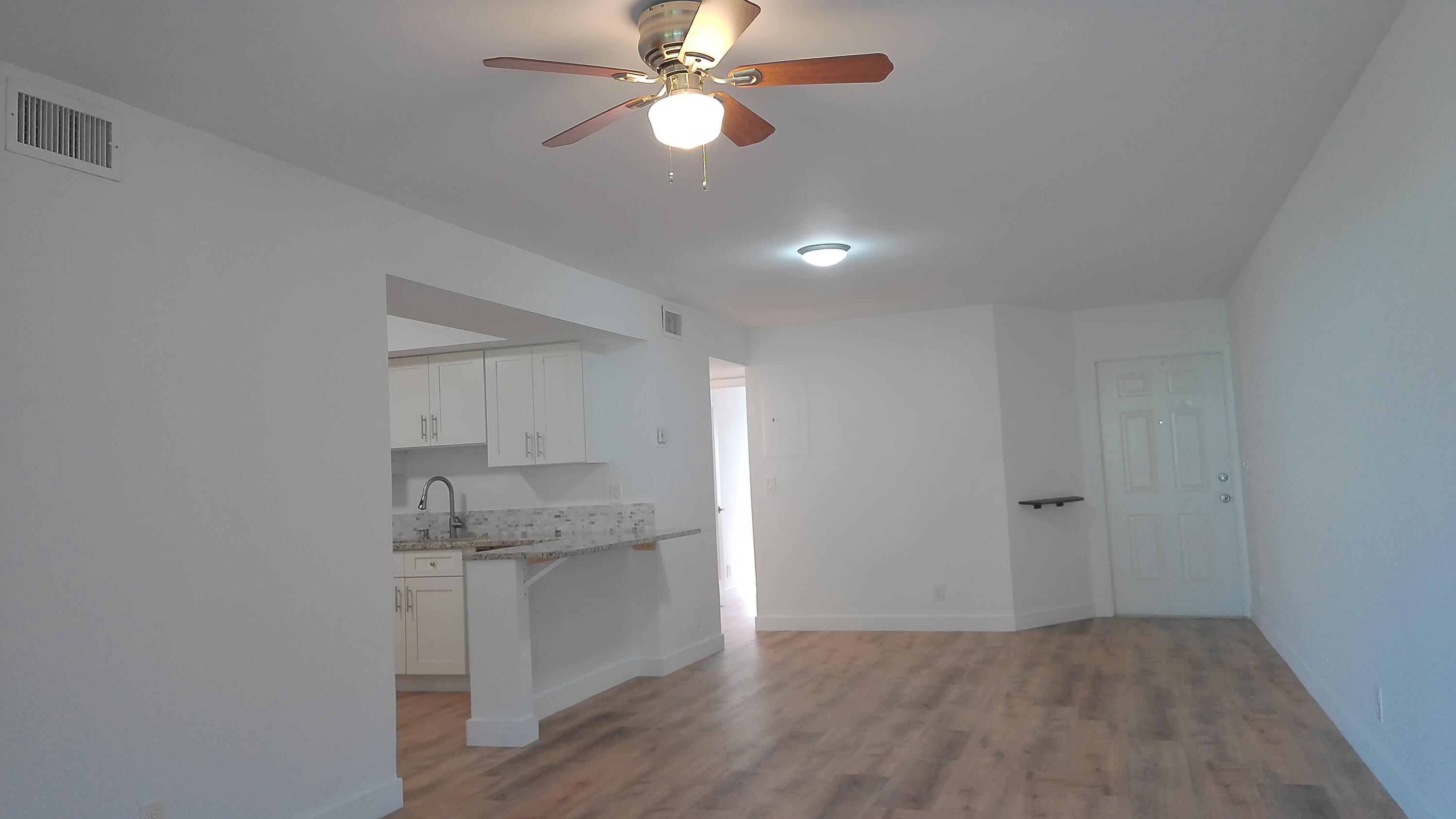 3180 Leewood Terrace, Unit L108 Boca Raton, FL 33431 - Photo 7 of 23 Living to Dining Area