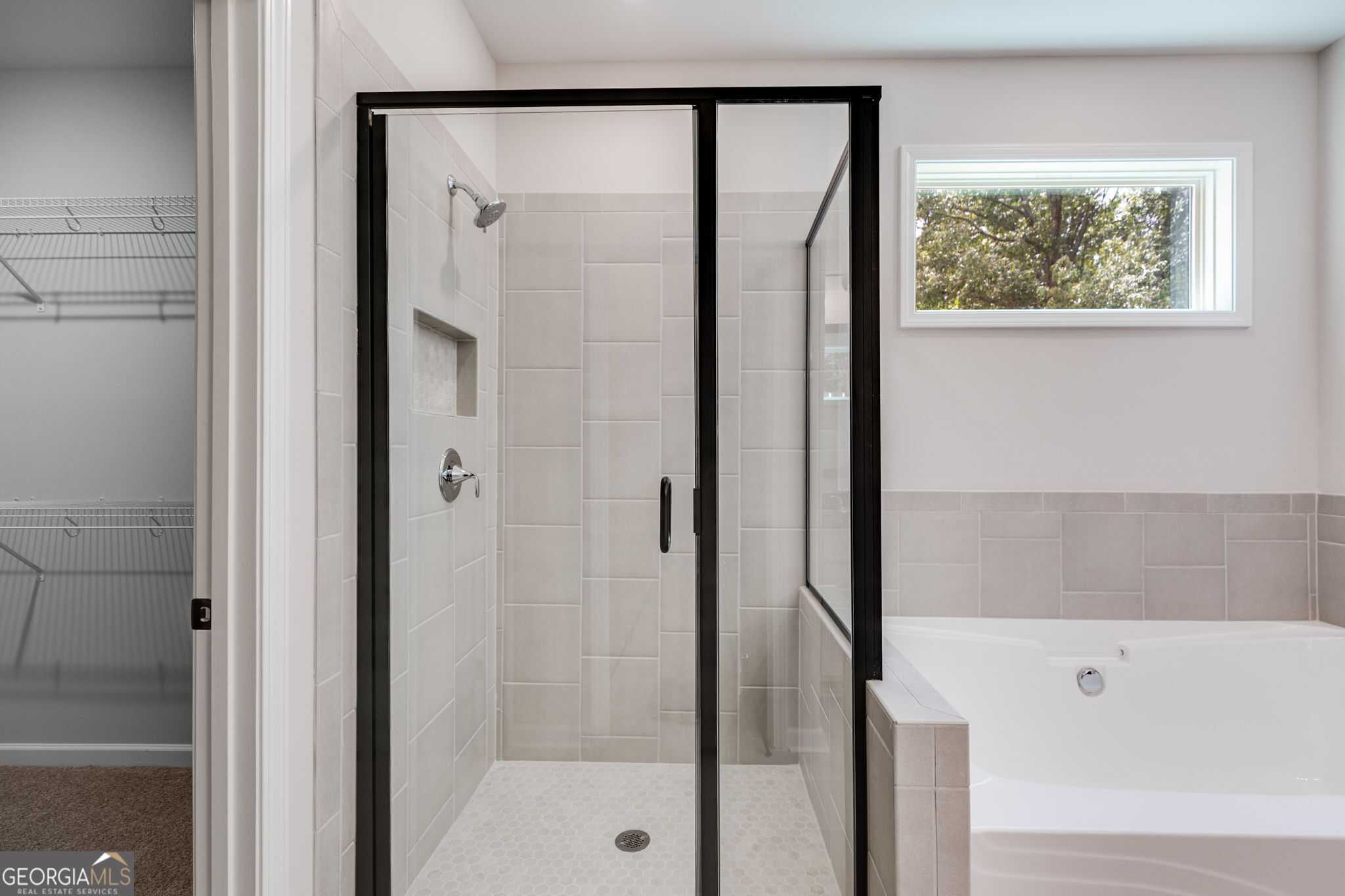 10 Avery Road Roopville, GA 30170 - Photo 29 of 46 a bathroom with a bathtub and a shower