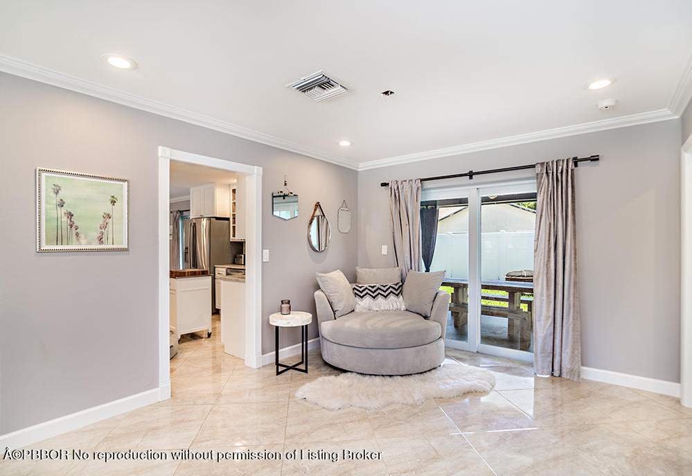 2285 Palm Road West Palm Beach, FL 33406 - Photo 11 of 27 a living room with furniture and a potted plant