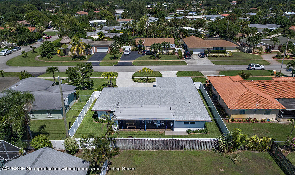 2285 Palm Road West Palm Beach, FL 33406 - Photo 25 of 27 an aerial view of residential houses with outdoor space and swimming pool