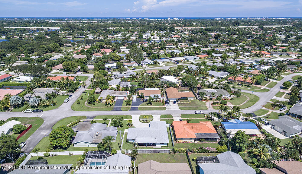 2285 Palm Road West Palm Beach, FL 33406 - Photo 26 of 27 an aerial view of residential houses with outdoor space and parking