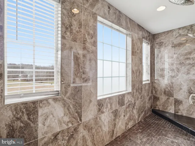 a view of a room that has a window in it