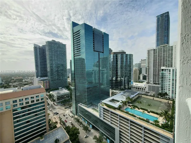a kitchen with stainless steel appliances a refrigerator and a sink