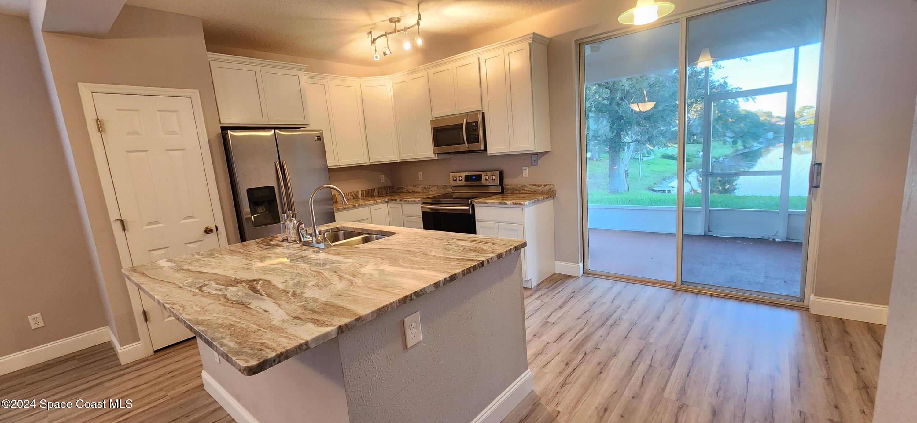 3856 Mt Carmel Lane Melbourne, FL 32901 - Photo 9 of 35 20241127_165832