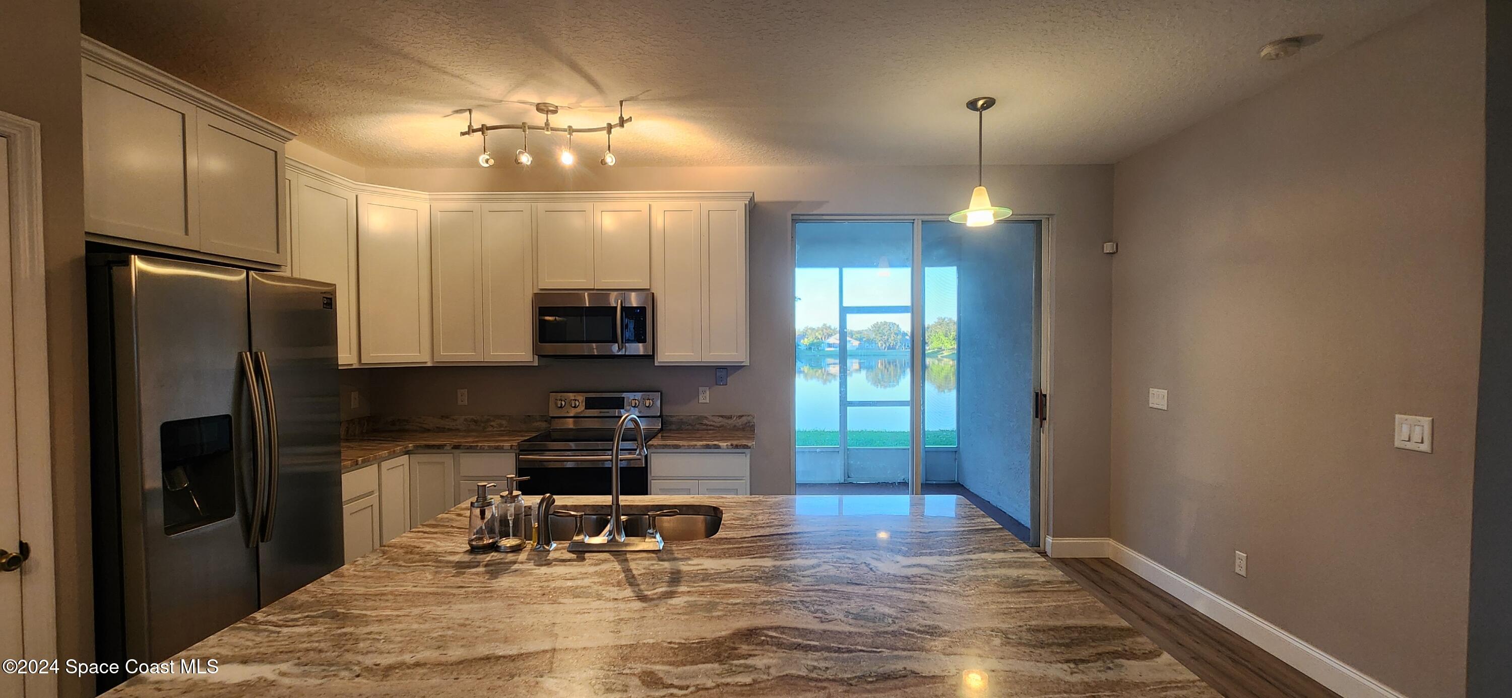 3856 Mt Carmel Lane Melbourne, FL 32901 - Photo 10 of 35 20241127_165905