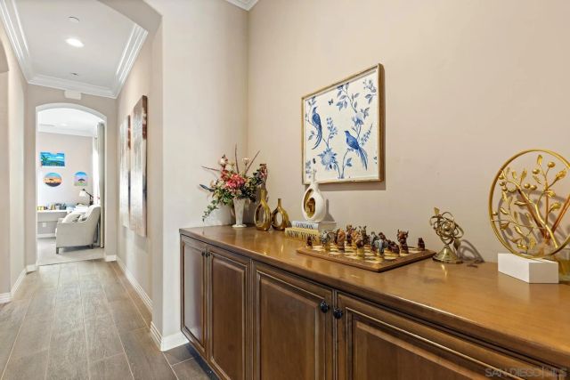 a bedroom with a bed and a dresser in it