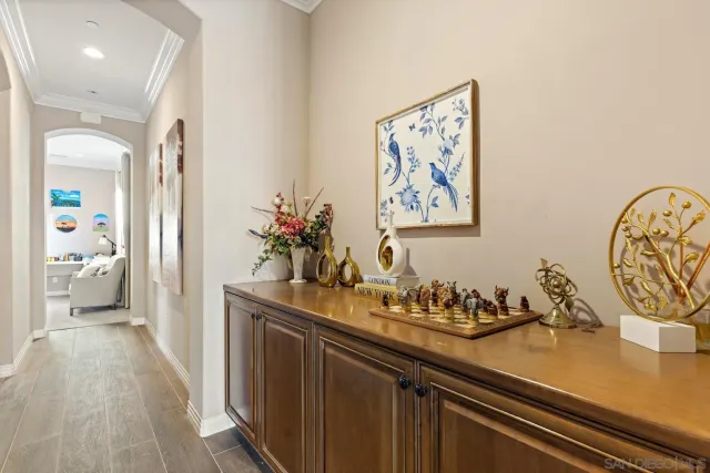 a bedroom with a bed and a dresser in it