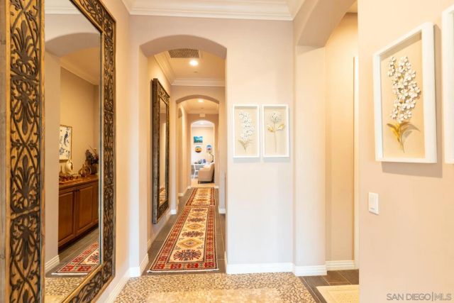 a view of a patio with a table chairs and a backyard