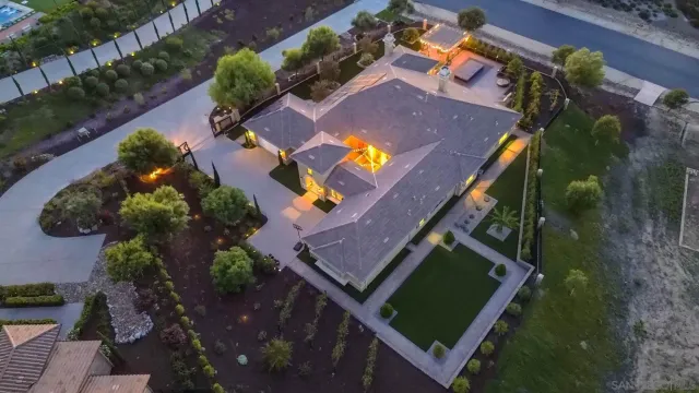 a lobby with furniture and floor to ceiling window