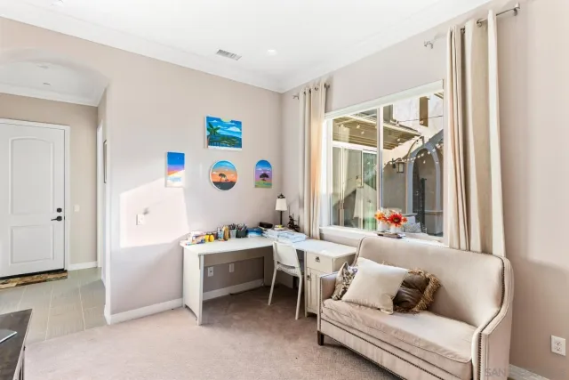 an aerial view of multiple houses with yard