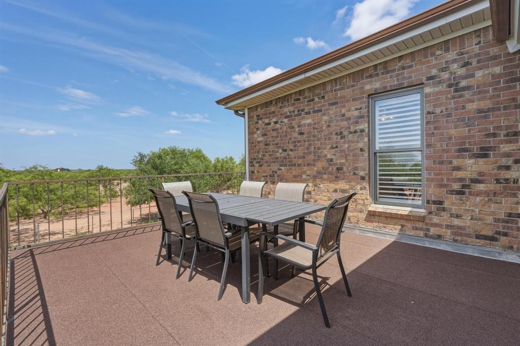 432 Clark Road Abilene, TX 79602 - Photo 33 of 40 a view of a patio with a table and chairs