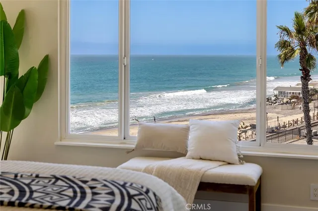 a spacious bathroom with a double vanity sink a mirror and a shower