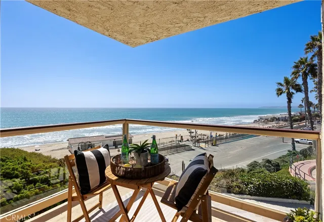 a view of swimming pool from a balcony