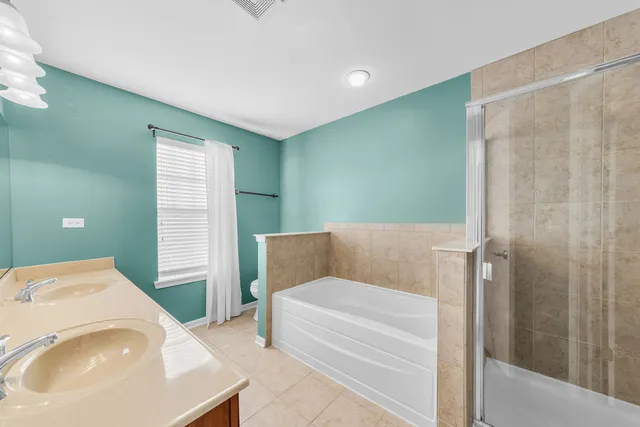 a bathroom with a sink and a bathtub