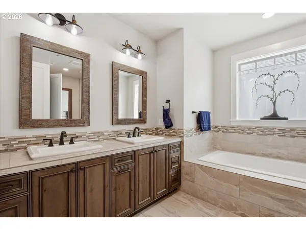 a kitchen with a sink and a refrigerator