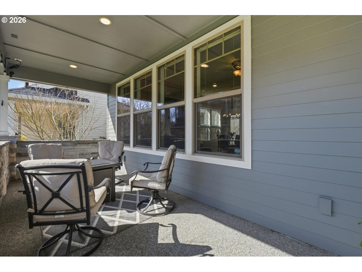 4026 Northwest 75th Avenue, Unit 70 Camas, WA 98607 - Photo 4 of 47 a view of a chairs and table in a patio
