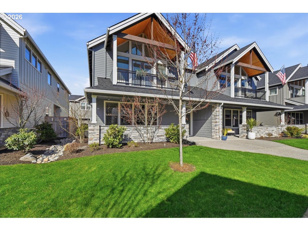 4026 Northwest 75th Avenue, Unit 70 Camas, WA 98607 - Photo 46 of 47 a front view of a house with a yard
