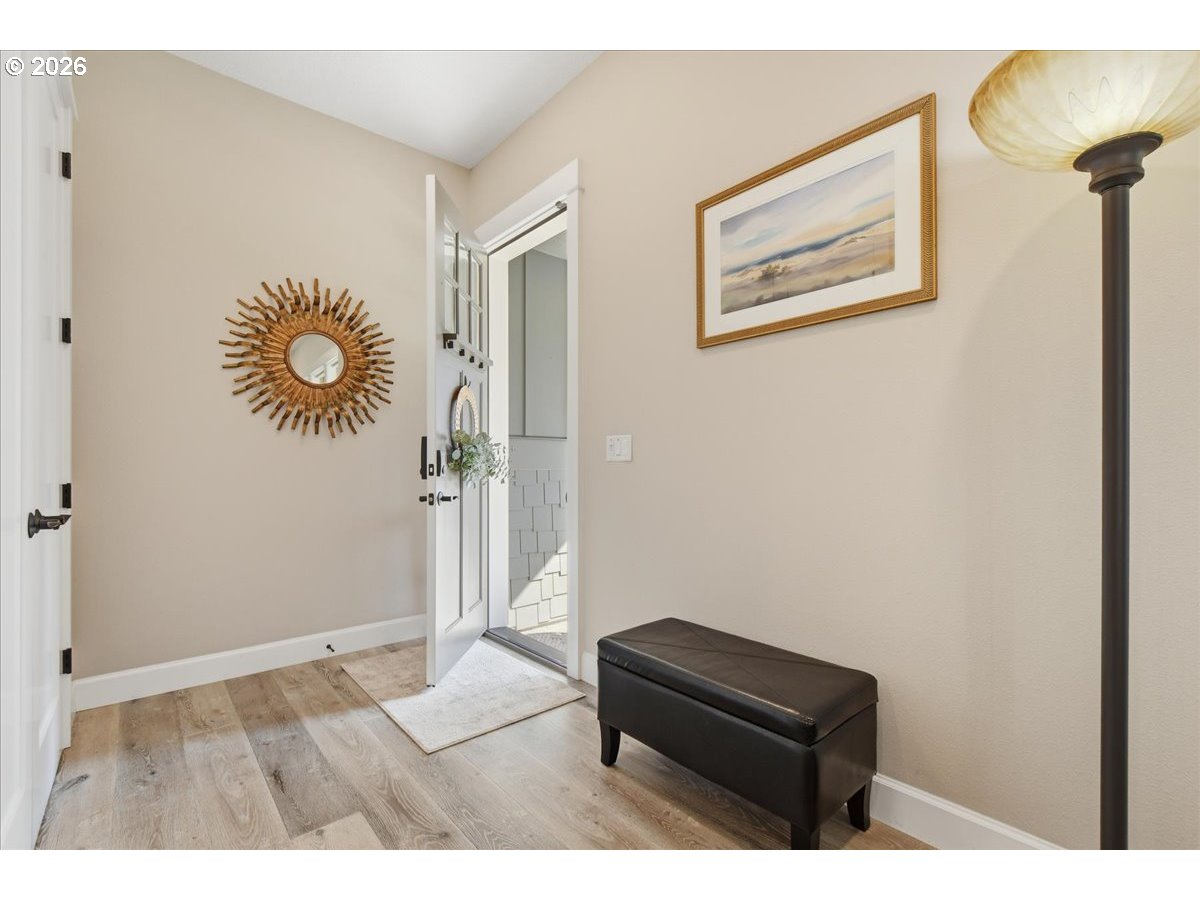 4026 Northwest 75th Avenue, Unit 70 Camas, WA 98607 - Photo 5 of 47 a view of room with furniture and wooden floor