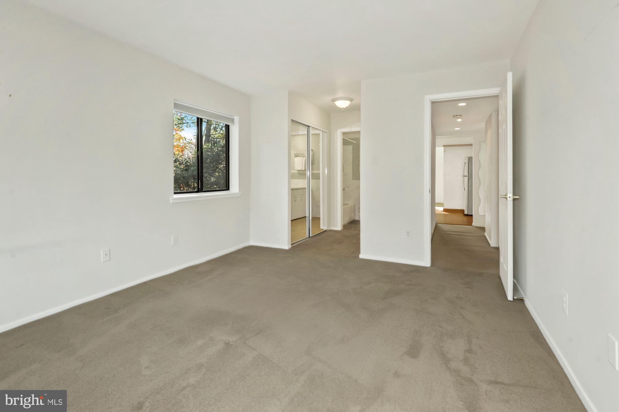 1639 Parkcrest Circle, Unit 300 Reston, VA 20190 - Photo 14 of 23 Dual closets lead to the private ensuite bath
