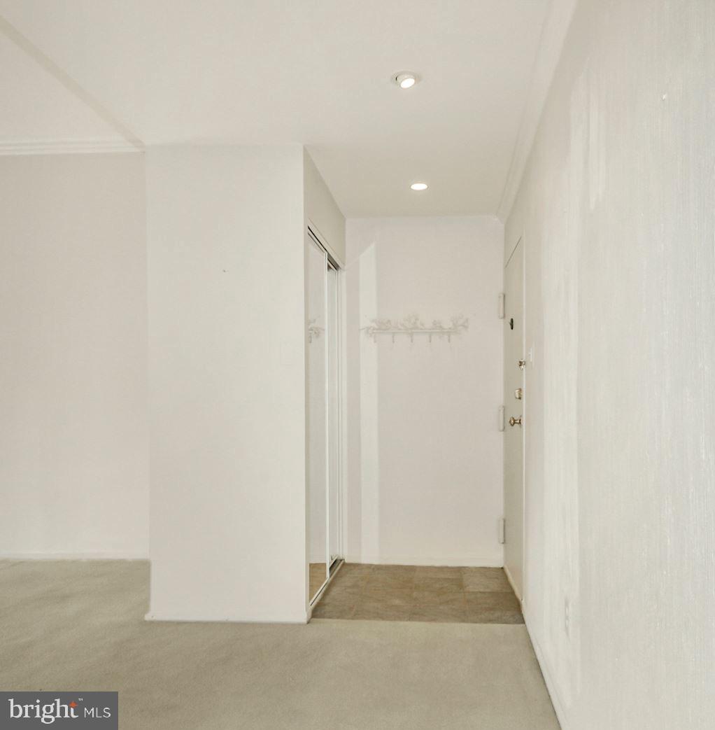 1639 Parkcrest Circle, Unit 300 Reston, VA 20190 - Photo 19 of 23 Tiled foyer with coat closet