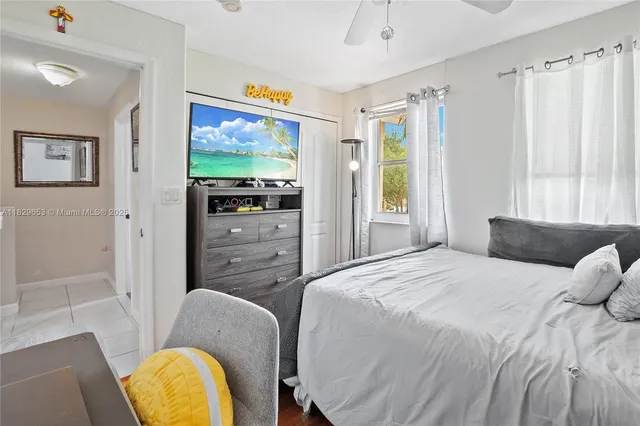 a bedroom with a bed and furniture