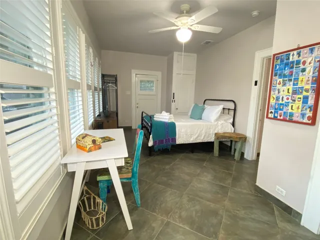 a view of a chairs and tables in a room