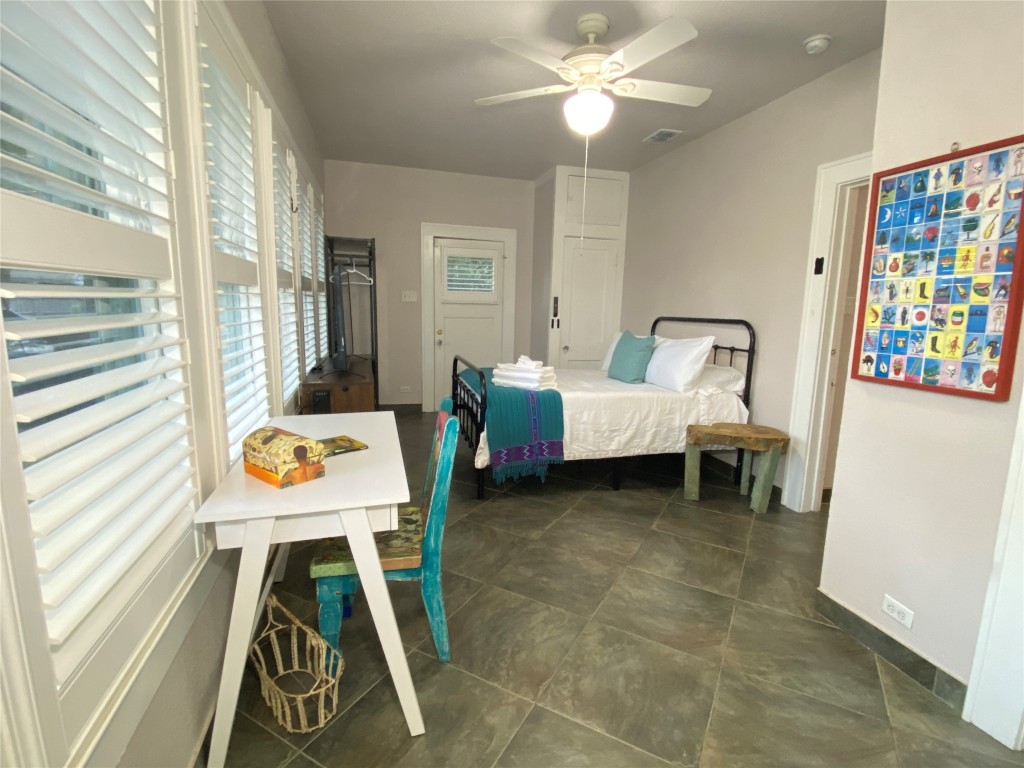 3101 Wheeler Street Austin, TX 78705 - Photo 4 of 16 a living room with chairs and a table