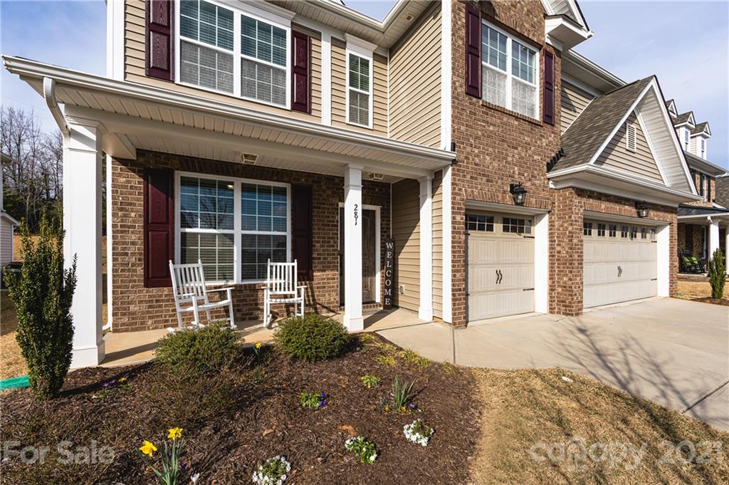 281 Annatto Way Tega Cay, SC 29708 - Photo 2 of 48 front view of a house with a large window