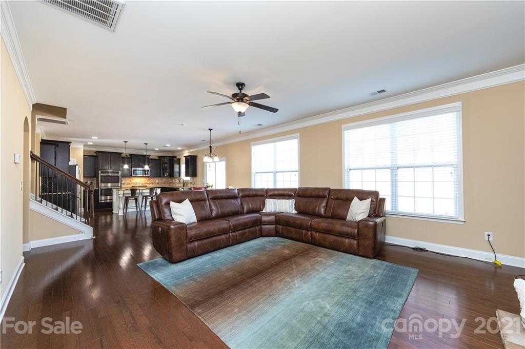 281 Annatto Way Tega Cay, SC 29708 - Photo 11 of 48 a living room with furniture and a large window
