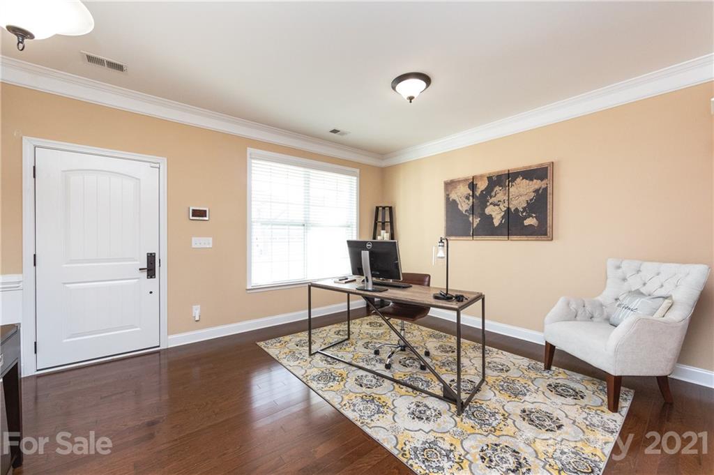 281 Annatto Way Tega Cay, SC 29708 - Photo 15 of 48 a work room with furniture and wooden floor