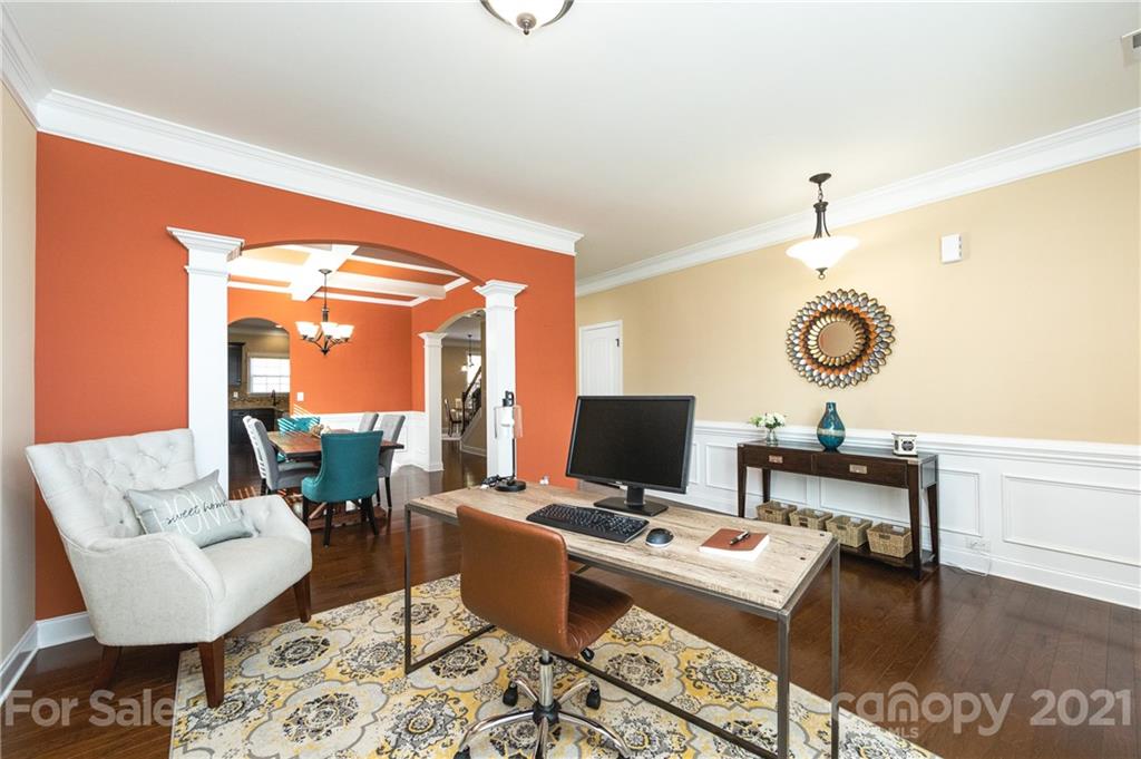281 Annatto Way Tega Cay, SC 29708 - Photo 16 of 48 a view of a workspace with furniture and a window