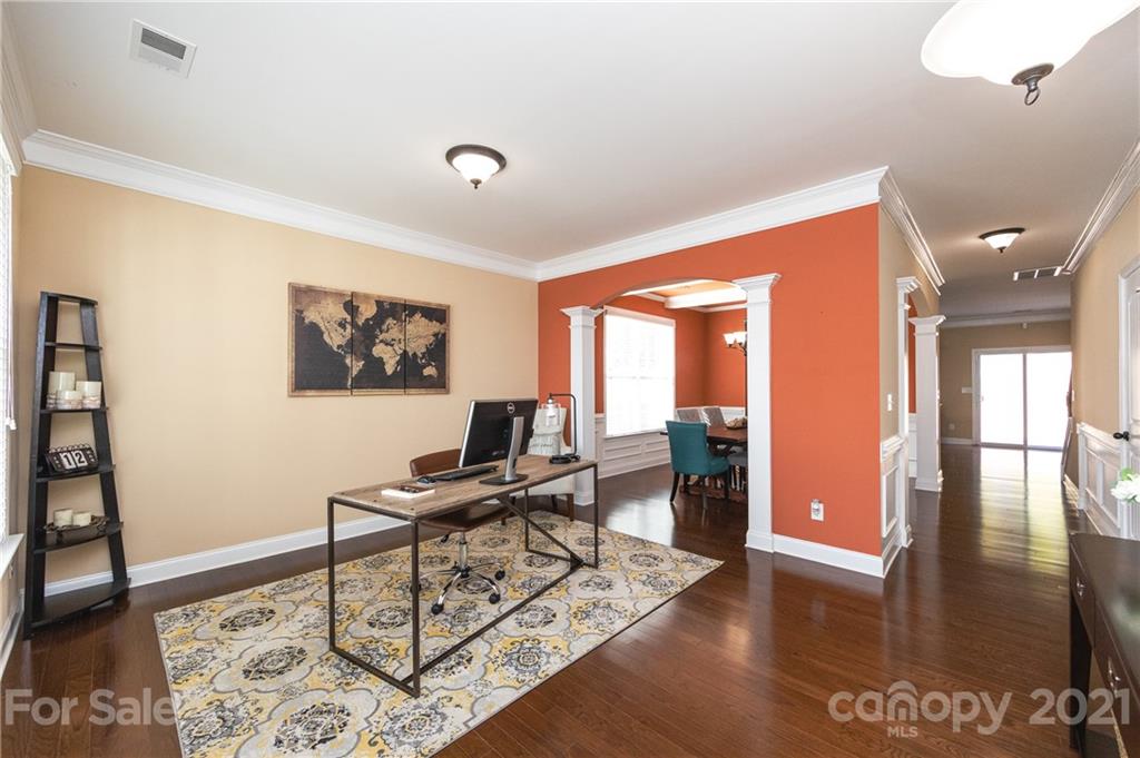 281 Annatto Way Tega Cay, SC 29708 - Photo 17 of 48 a work room with furniture and wooden floor