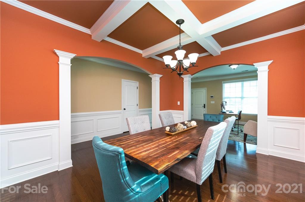 281 Annatto Way Tega Cay, SC 29708 - Photo 18 of 48 a dining room with a table and chairs