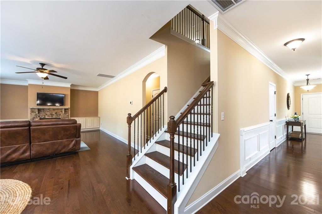 281 Annatto Way Tega Cay, SC 29708 - Photo 24 of 48 a view of entryway and hall with wooden floor