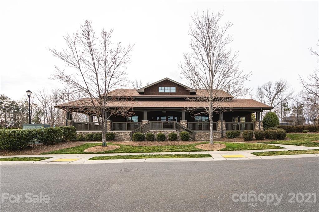 281 Annatto Way Tega Cay, SC 29708 - Photo 45 of 48 a view of a house with a yard and sitting area
