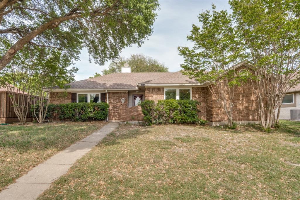 1509 Clover Drive Allen, TX 75002 - Photo 1 of 25 a front view of a house with a yard