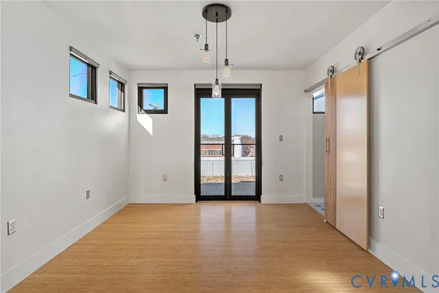 a bathroom with a toilet a sink and a mirror