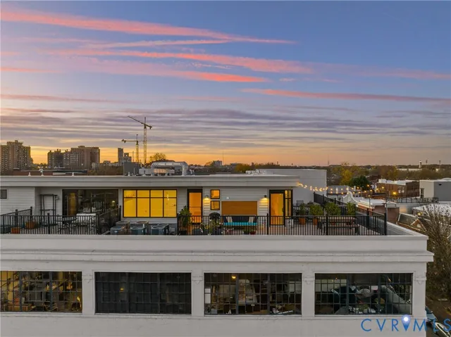 a view of a swimming pool with a chairs